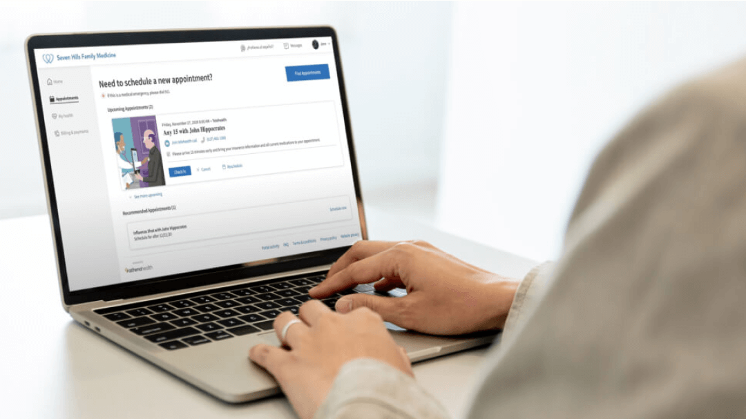 patient accessing athenahealth's patient portal to schedule appointment on laptop